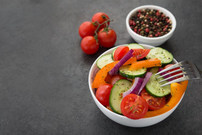 Fresh vegetables salad, tomato, pepper, cucumber