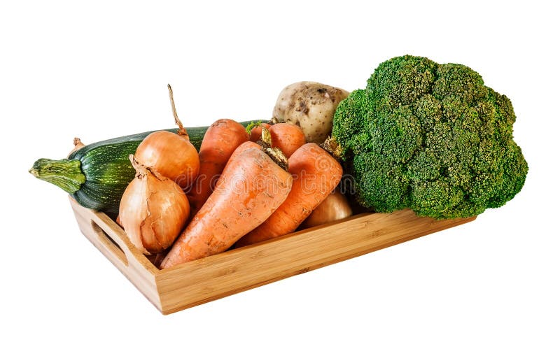 Fresh vegetables on wooden tray isolated on white