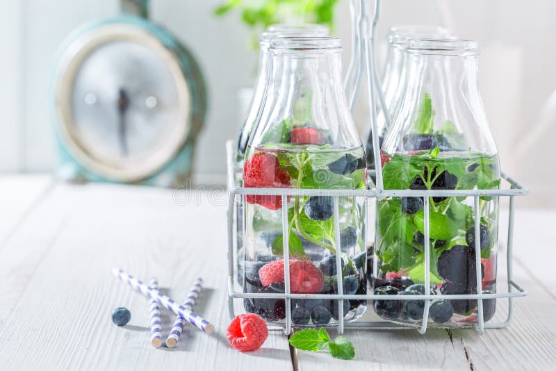 Fresh Water in Bottle with Berries and Mint Leaves Stock Image Image