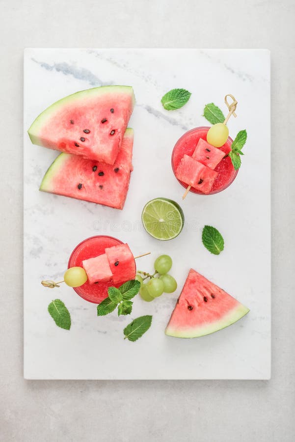 Fresh watermelon juice with mint and lime stock images
