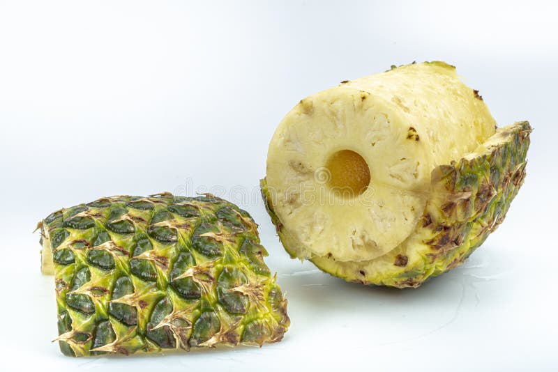 Fresh Whole and Cut Pineapple Isolated on White Background. from Top