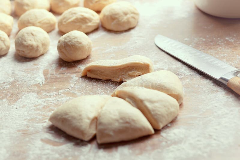 Fresh Yeast Dough For Pizza Or Bread, Cut Into Small Pieces And Rolled