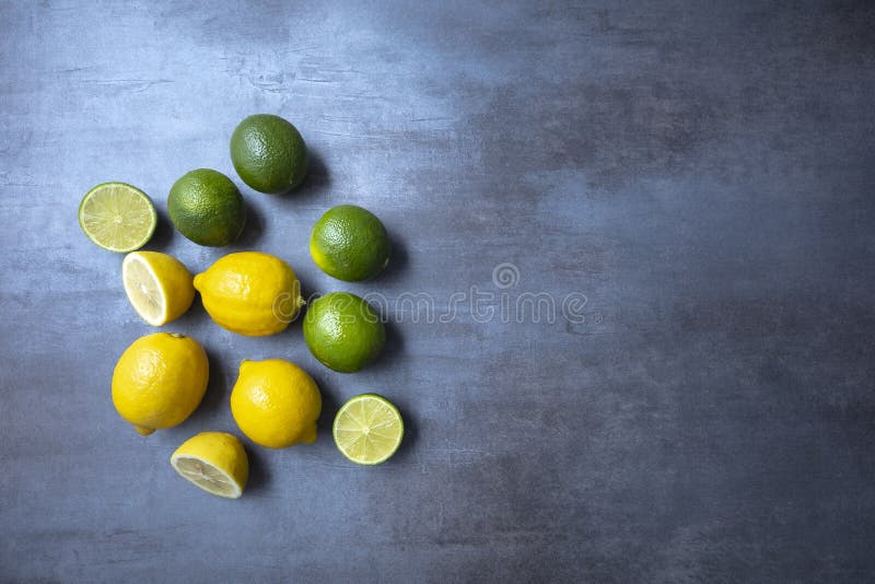 Fresh Yellow Lemons and Fresh Green Lemons, Seen from Above, Free Space