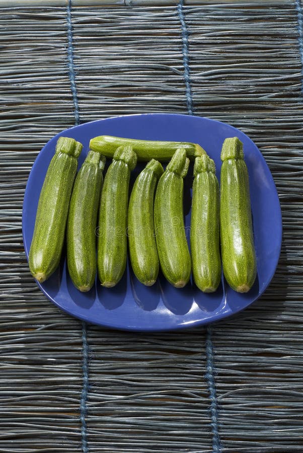 Fresh zucchinis stock photo. Image of squash, plate, vegetable 7166168