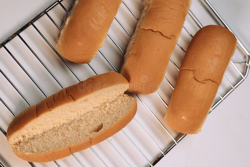 Freshly baked hot dog buns stock image. Image of homemade 258553971