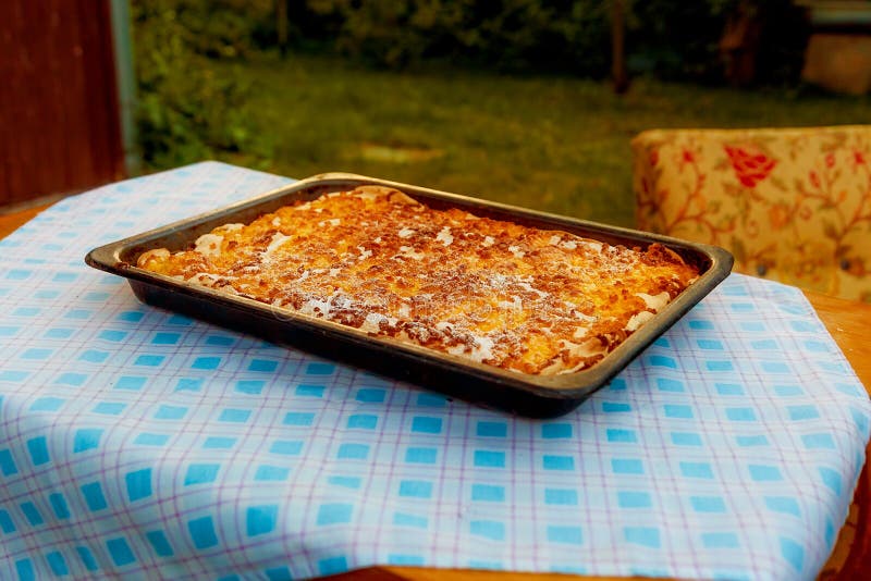 Freshly Baked Pie In A Sheet On A Table. Stock Photo Image of pastry