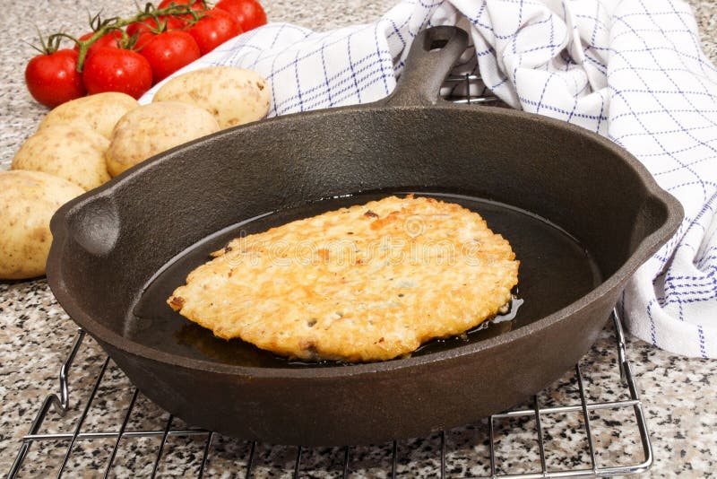 Freshly Baked Potato Pancake in a Pan Stock Photo Image of food