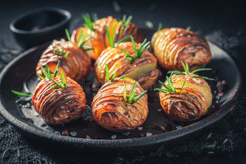 Freshly Baked Baked Potatoes Made with Salt and Rosemary Stock Image