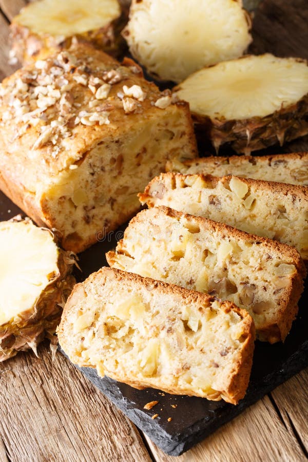 Freshly Baked Sliced Pineapple Bread with Walnuts Closeup. Vert Stock
