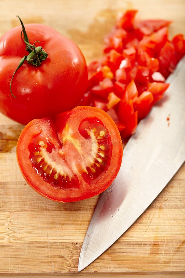 Freshly Chopped Tomatoes On A Wooden Board Stock Image Image of kitchen, organic 36139909