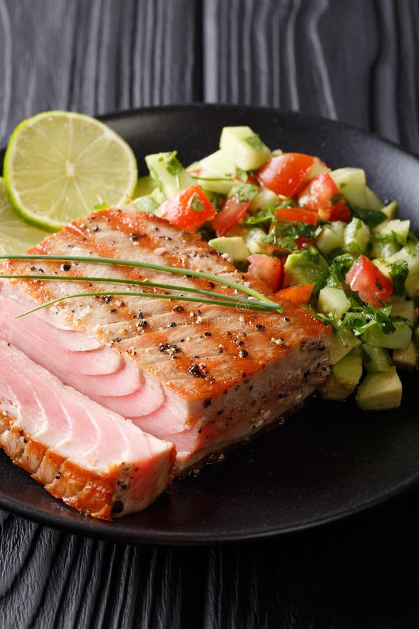 Freshly Cooked Grilled Tuna Steak with Avocado Cucumber Salsa Cl Stock ...