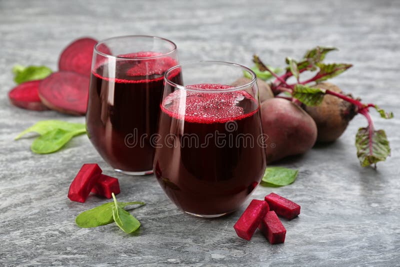 Freshly made beet juice on table royalty free stock photography