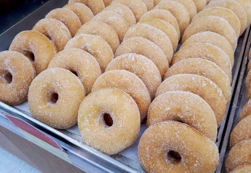 Freshly made sugar donuts stock photography