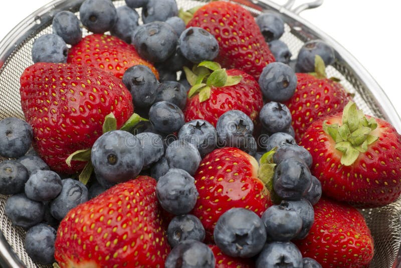 Washed Fresh Blueberries and Strawberries stock photo Washed Fresh Blueberries and Strawberries stock photo