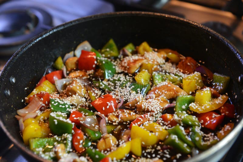 Freshly prepared stir fry with chicken and vegetables in a wok royalty free stock image Freshly prepared stir fry with chicken and vegetables in a wok royalty free stock image