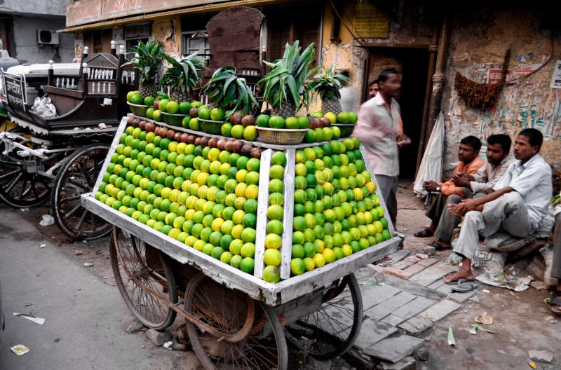 DEHLI - SEPTEMBER 21. Vendor selling freshly squeezed juices, 21 September 2007 in Delhi, India. Many Indians eat from fresh food stalls on the street rather than eating at home.