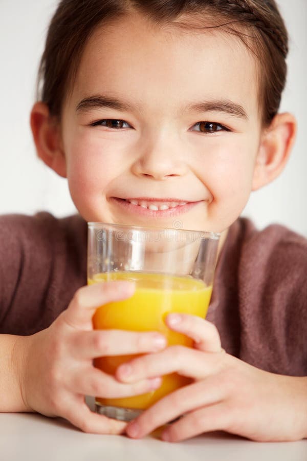 freshly-squeezed-orange-juice-closeup-of-an-adorable-little-girl