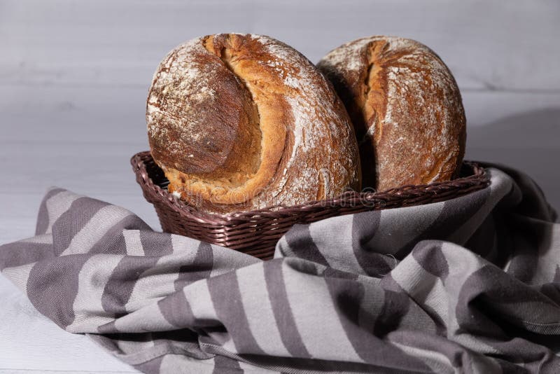 Freshly and Warm Mixed Wheat German Bread in the Basket Stock Photo