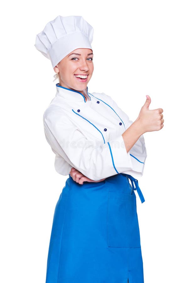 Freundlicher Jungekoch, der sich Daumen zeigt lizenzfreies stockbild Freundlicher Jungekoch, der sich Daumen zeigt lizenzfreies stockbild