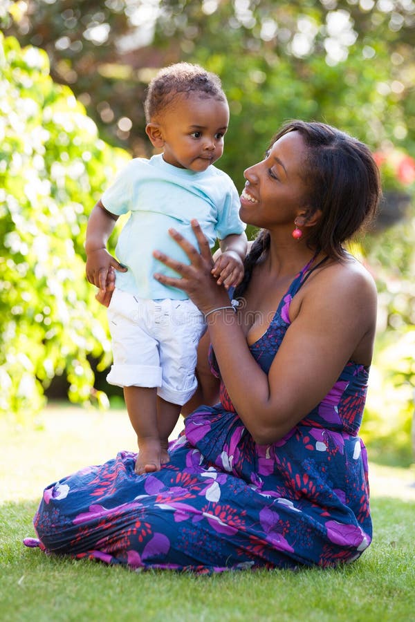 Frican mother with playing her baby boy