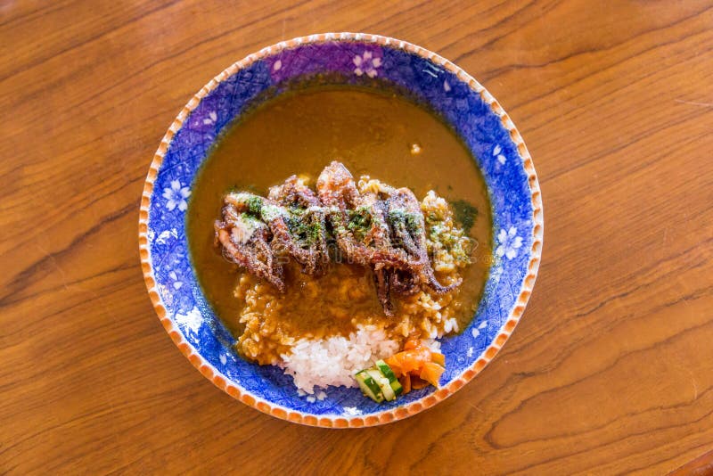 Fried Baby Octopus Curry Over Rice Stock Photo Image of lunch, squid