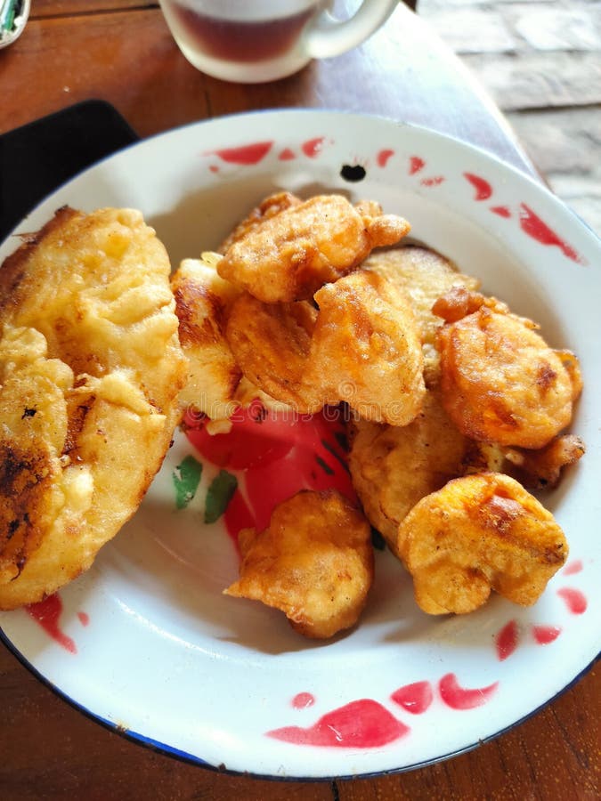 Fried Bananas and Fried Tape Served on a Zinc Plate. Stock Photo