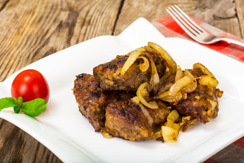 Fried Beef Liver with Onions, Curry and Spices Stock Photo Image of