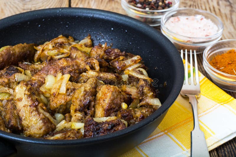 Fried Beef Liver with Onions, Curry and Spices Stock Photo Image of
