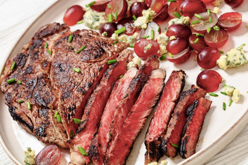 Fried Beef Steak with Salad of Grape, Cheese Stock Image - Image of