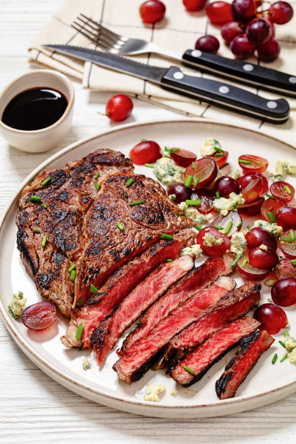 Fried Beef Steak with Salad of Grape, Cheese Stock Image - Image of