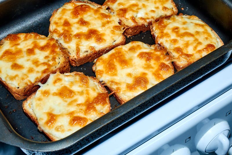 Fried Bread with Cheese and Mayonnaise on the Black Tray Stock Image
