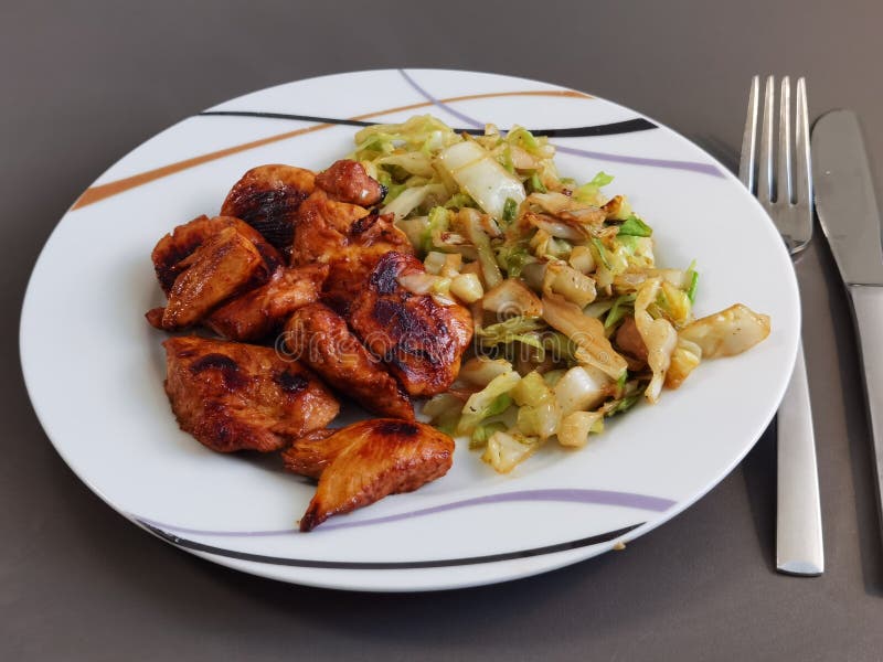 Fried cabbage with chicken stock photo. Image of meat 224381078