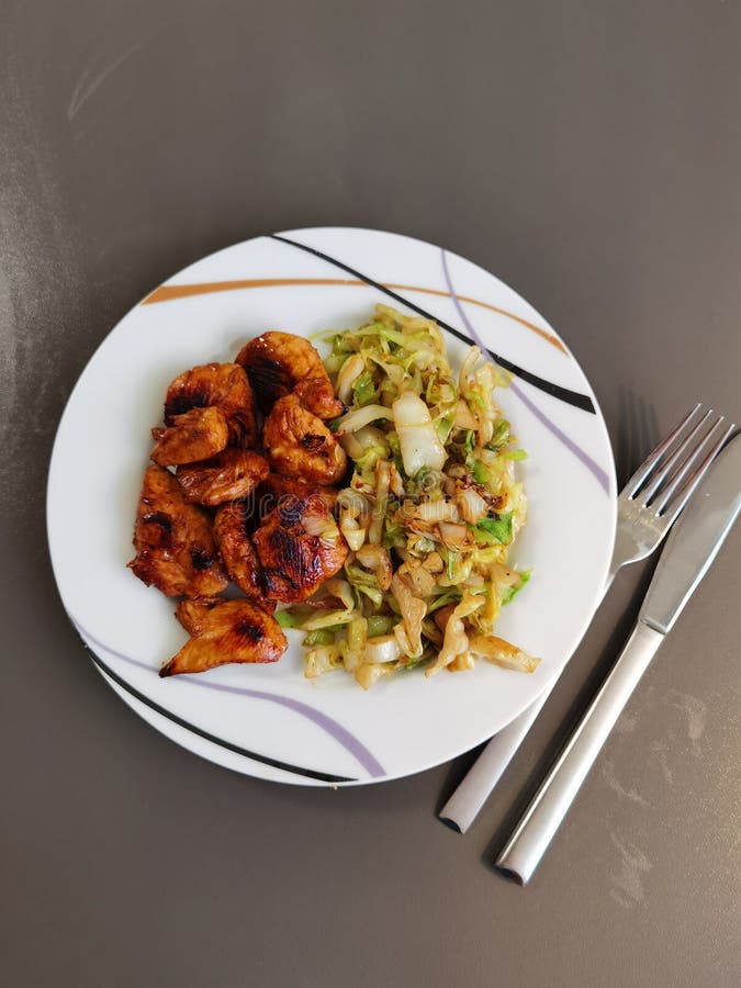 Fried cabbage with chicken stock photo. Image of dish 224381102