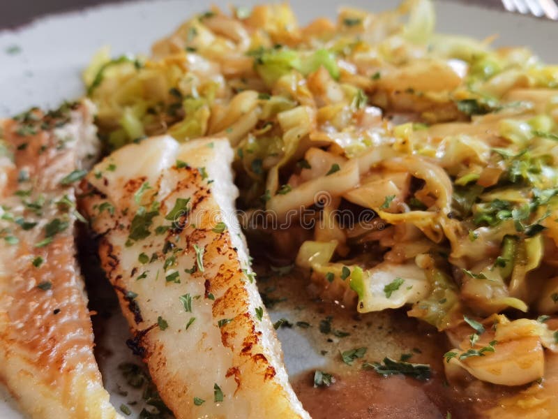 Fried cabbage with fish stock image. Image of soup, vegetable 224478467