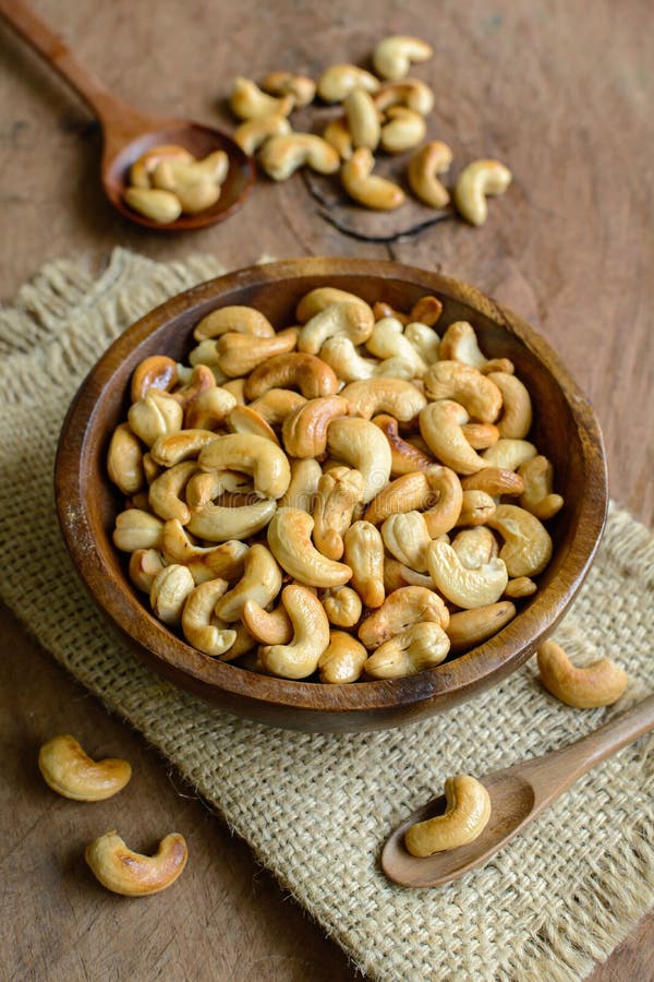 Fried Roasted Cashew Nuts On Wooden Background Stock Photo - Image of