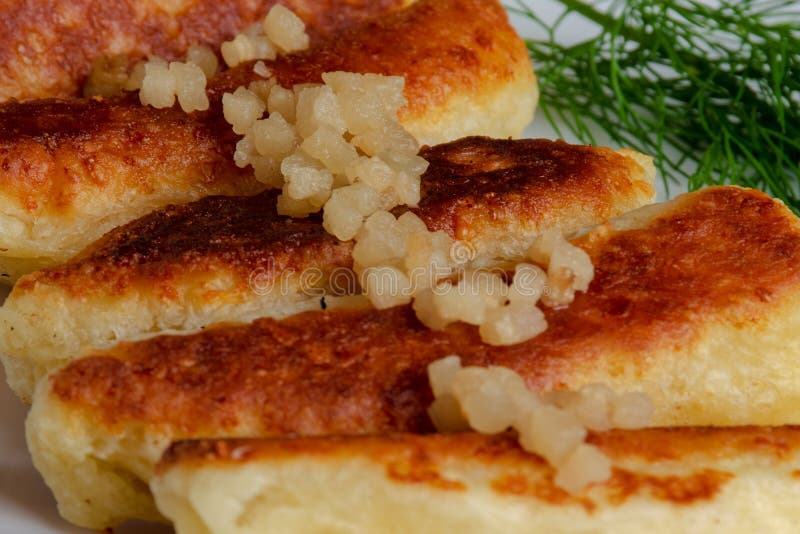 Fried cheese and kefir sticks served in white plate. Made from cheese, flour and kefir. royalty free stock image Fried cheese and kefir sticks served in white plate. Made from cheese, flour and kefir. royalty free stock image