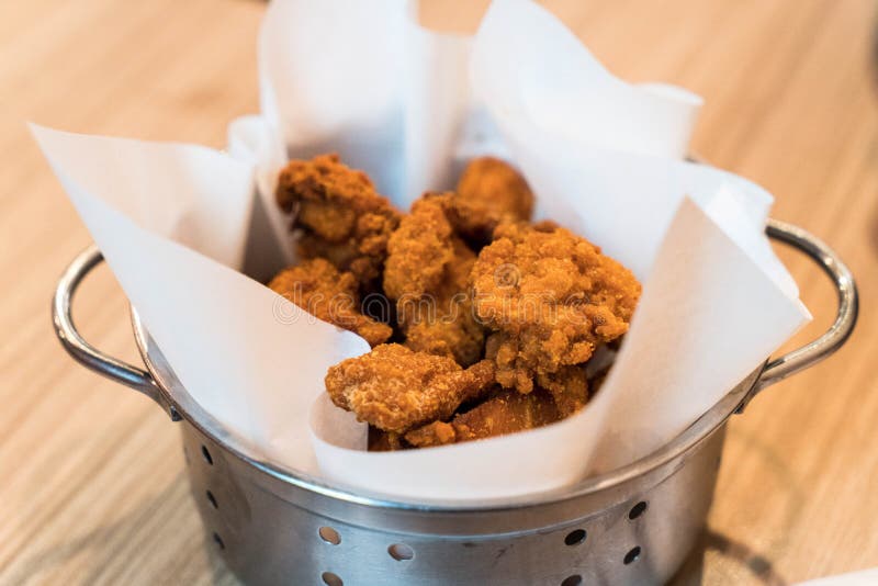 Fried chicken in bucket royalty free stock photos