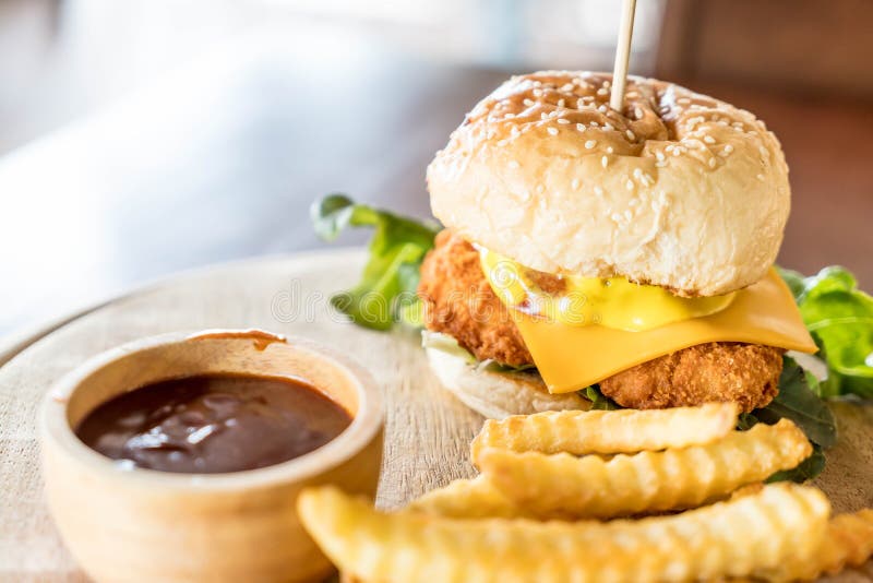 Fried chicken with cheese burger stock image