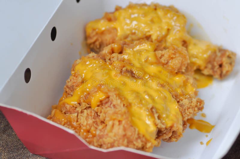 Fried Chicken, Deep Fried Chicken with Cheese Topping Stock Image