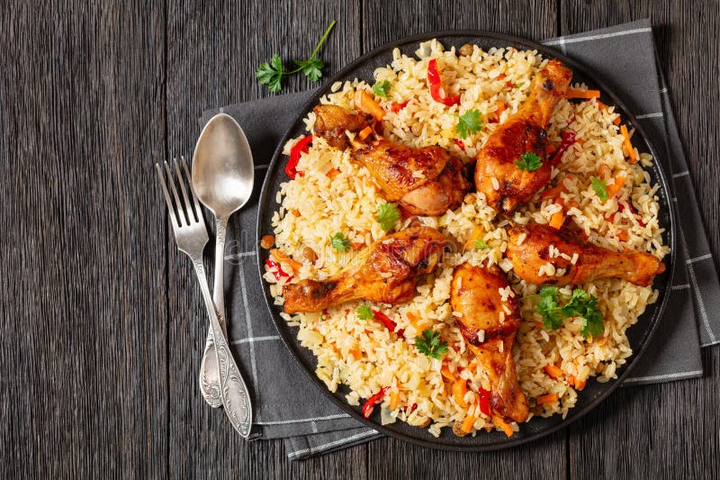 Fried Chicken Drumsticks Over Rice Pilaf, Top View Stock Image - Image ...