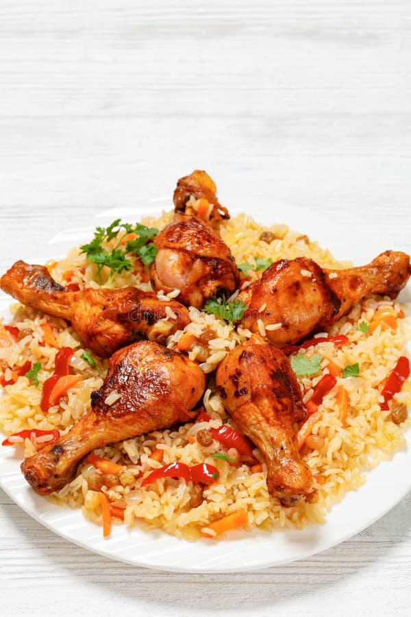 Fried Chicken Drumsticks Over Rice Pilaf, Top View Stock Photo - Image ...