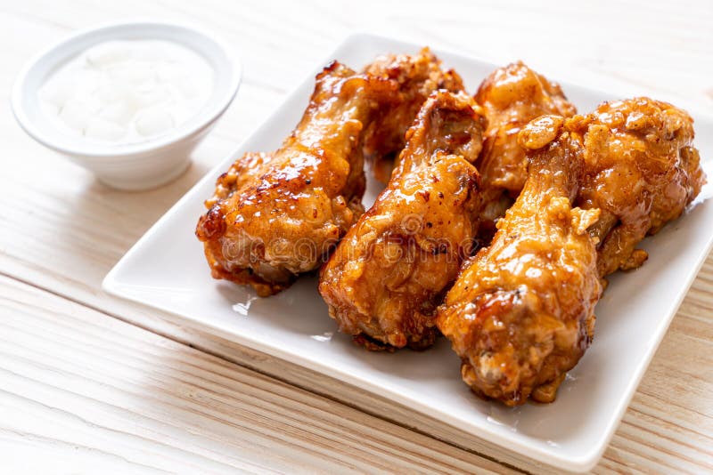 Fried chicken with sauce stock image. Image of cuisine 217985329