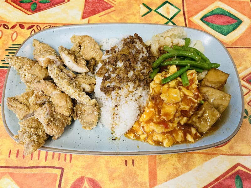 Fried Chicken Tenders with Rice and Vegetables. Stock Photo Image of