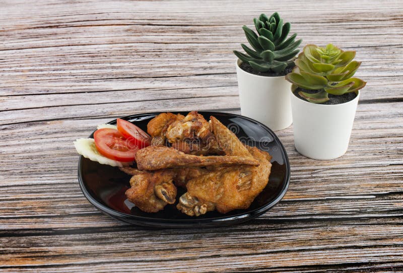 Fried Chicken Wings with Fish Sauce is a Popular Menu in Thai