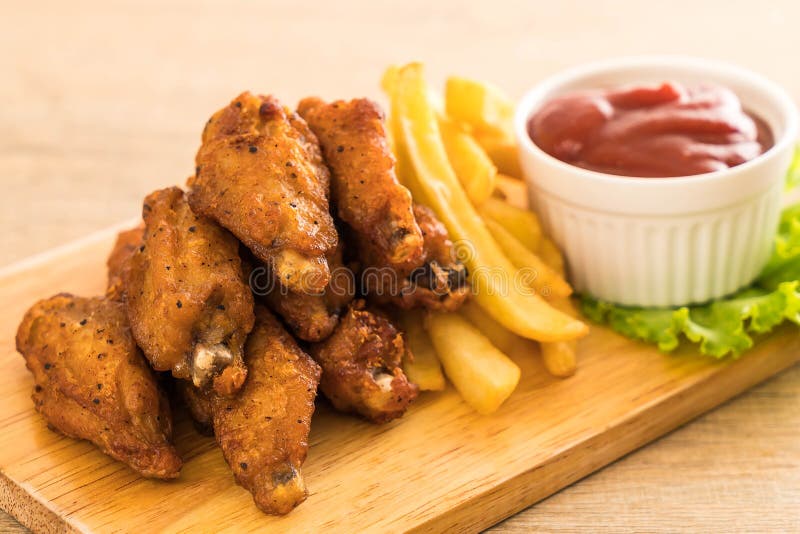 Fried chicken wings royalty free stock photos