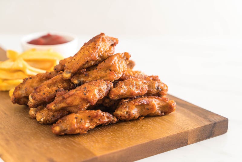 Fried chicken wings royalty free stock photos