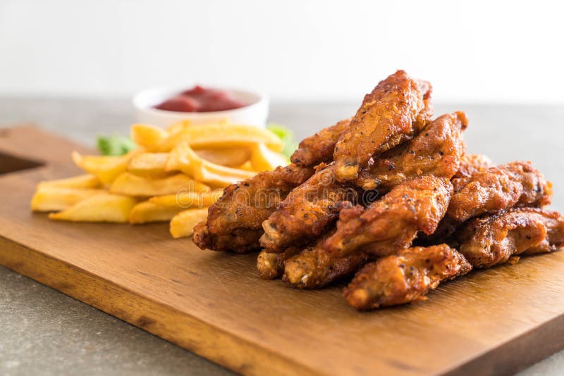 Fried chicken wings royalty free stock photos