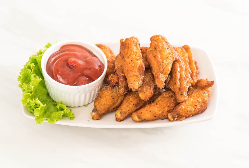 Fried chicken wings royalty free stock photos