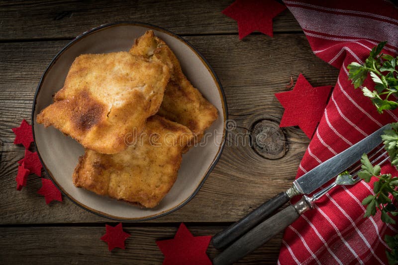 Fried cod slices in breadcrumbs. stock images