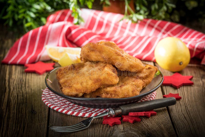 Fried cod slices in breadcrumbs. royalty free stock image